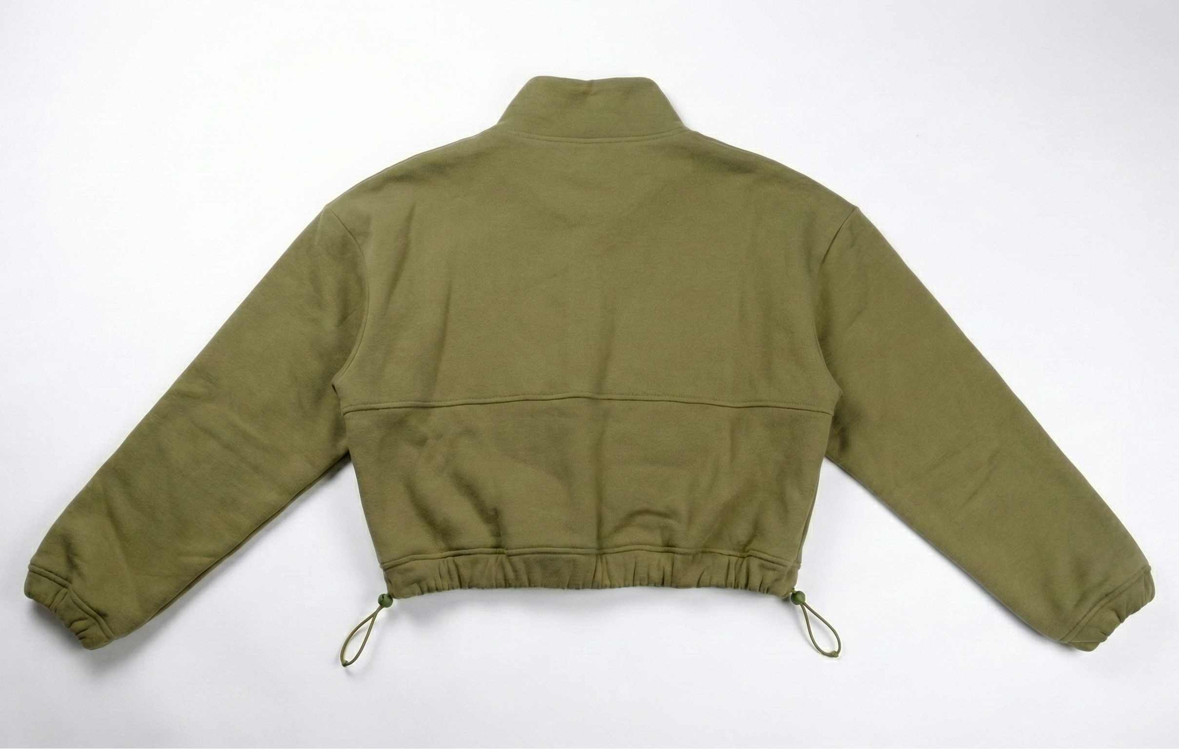 Olive colored jacket on a white background