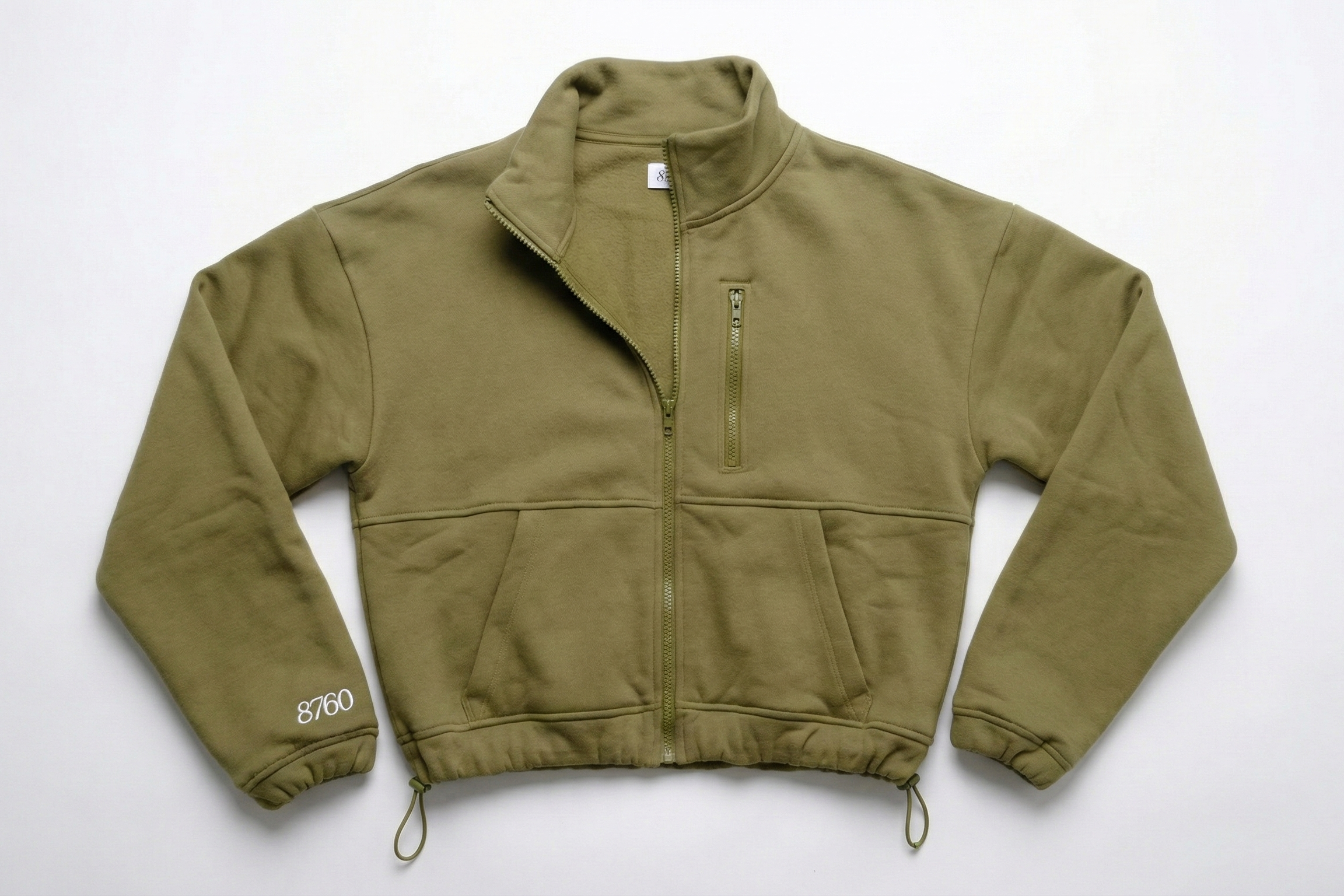 Olive green jacket on a white background